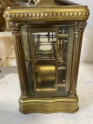 Lot 179 - French brass serpentine cased carriage clock