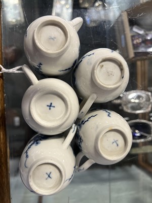 Lot 2 - Five porcelain teacups, blue floral decoration