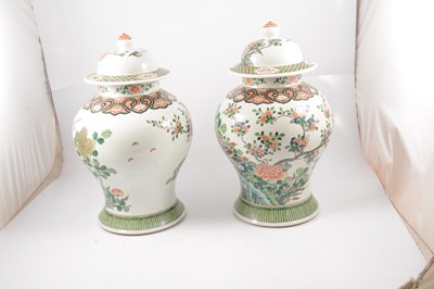 Lot 14 - Pair of Chinese famille vert covered jars