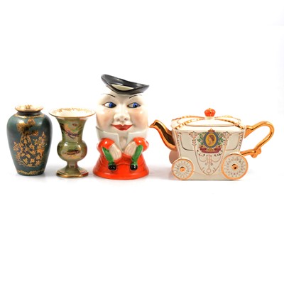 Lot 27 - Musical Humpty Dumpty jug, two Crown Devon Lustrine vases, and a Coronation coach teapot.