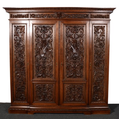 Lot 379 - French walnut breakfront armoire