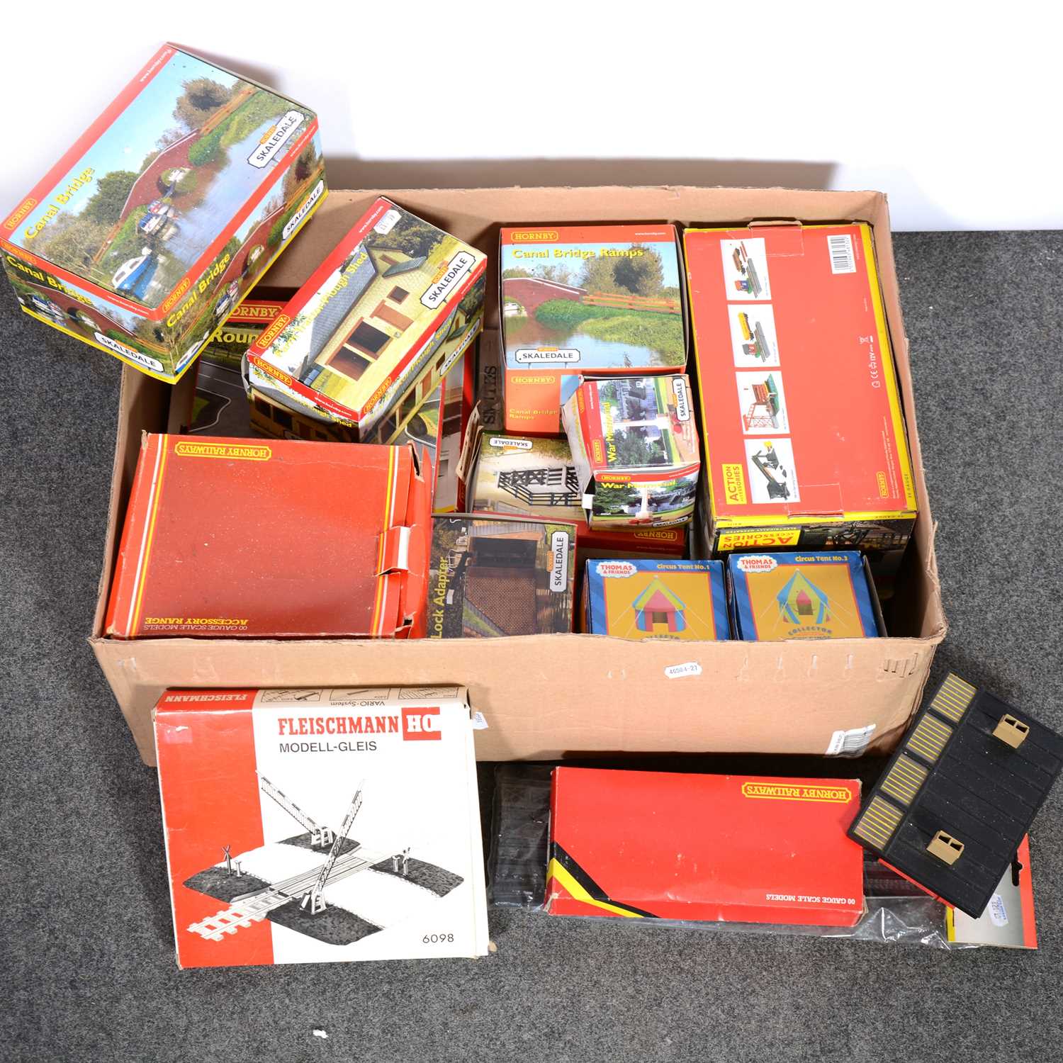 Lot 127 - OO gauge track-side buildings and accessories, one tray including Hornby Canal Bridge