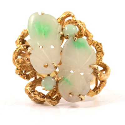Lot 53 - A large two tone jade dress ring marked 585.