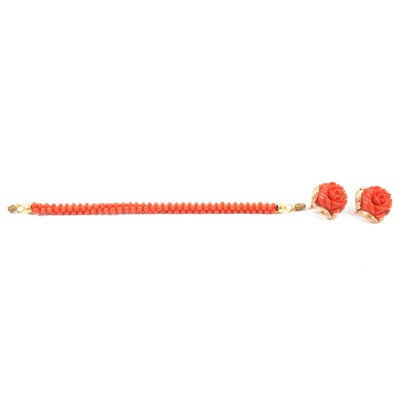 Lot 359 - A pair of coral earclips and bracelet.