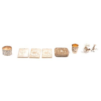 Lot 241 - Wang Hing white metal shot cup, pepperette, napkin ring, and other white metal plaques and figures.