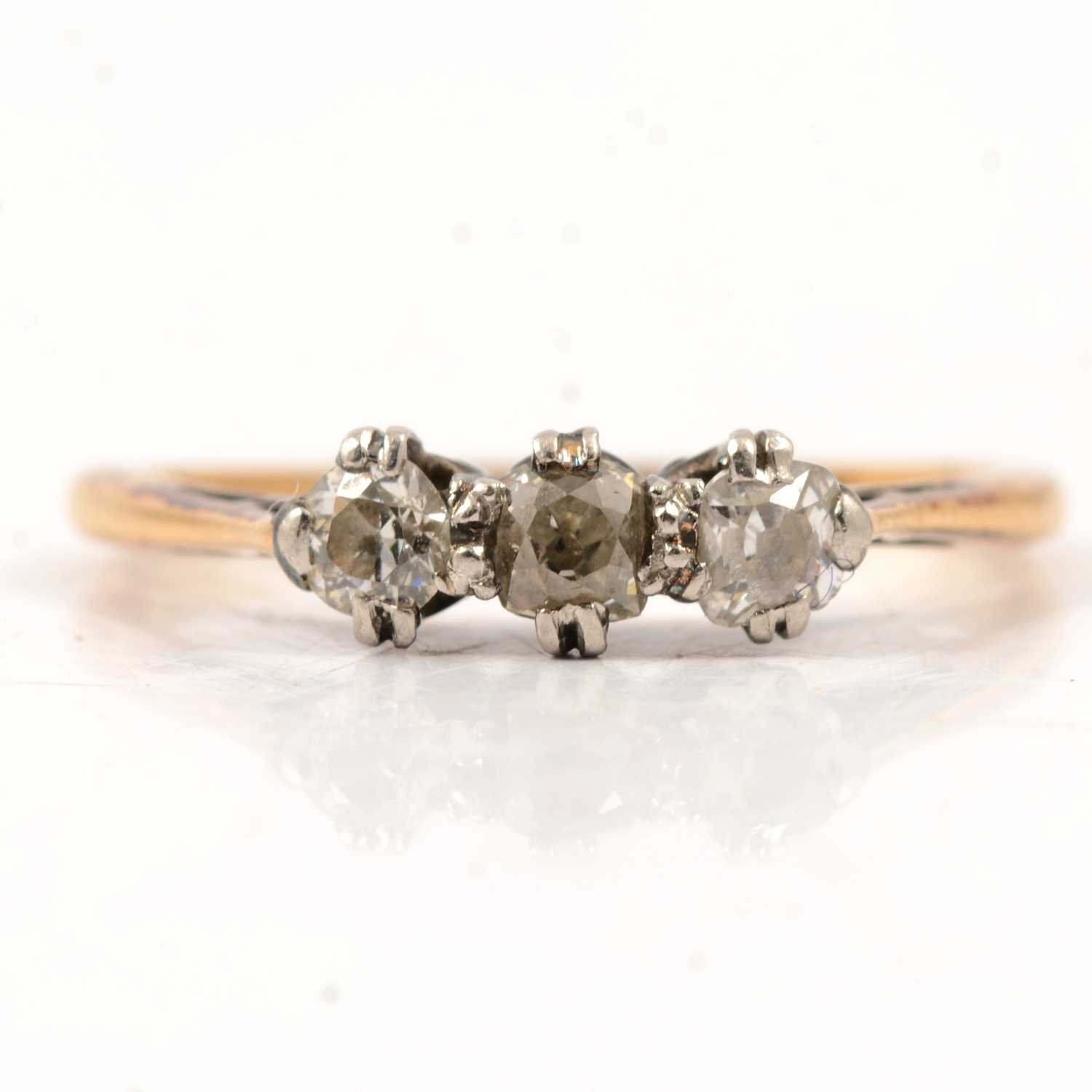 Lot 3 - A diamond three stone ring.