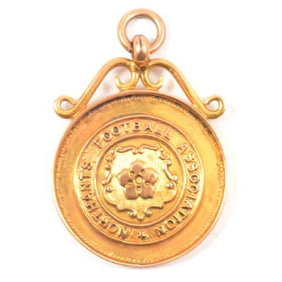 Lot 106 - A 9 carat yellow gold Northants Football Association Medal.
