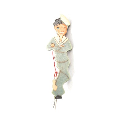 Lot 261 - Fifteen novelty celluloid and ivorine brooches, amusing figures.