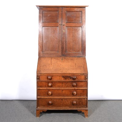 Lot 389 - George III oak bureau bookcase