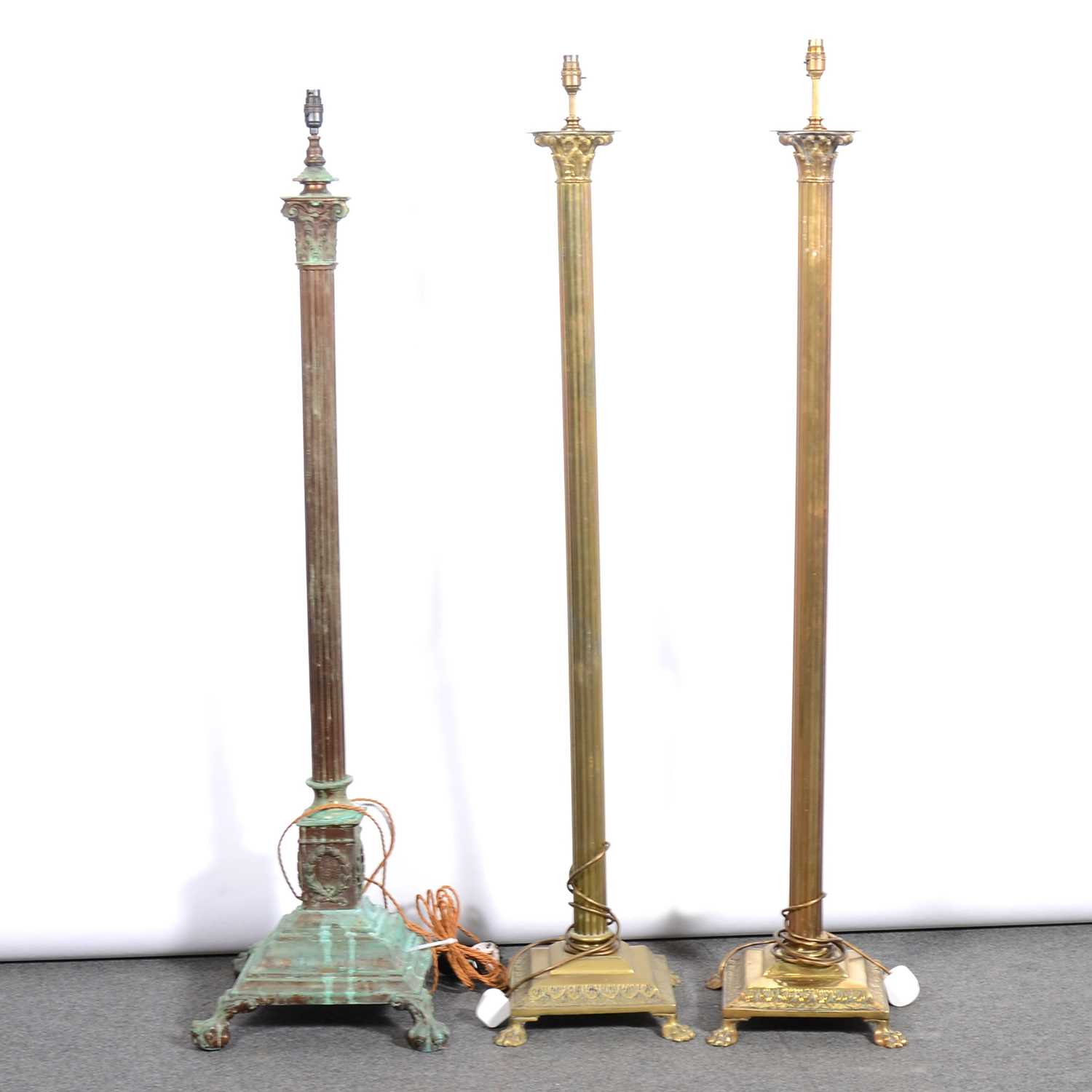 Lot 338 - Pair of lacquered brass standard lamps, and another similar