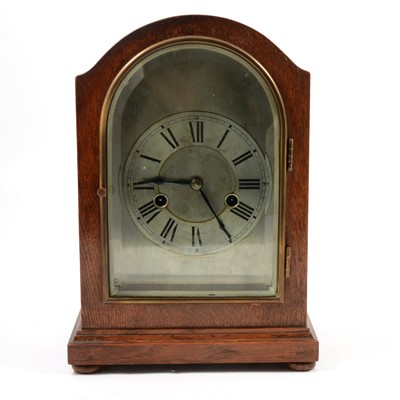 Lot 113 - Oak cased mantel clock, eight-day movement striking on a gong