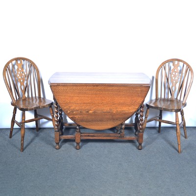 Lot 339 - Oak gateleg table and four beechwood chairs