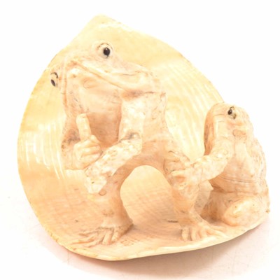Lot 124 - Japanese ivory okimono, Meiji period, carved as two toads on a leaf