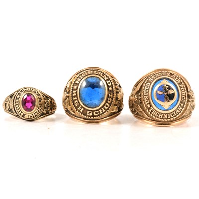 Lot 70 - Three American style college rings.
