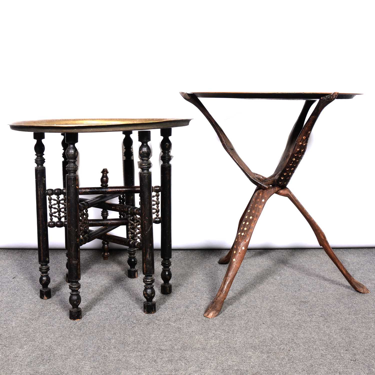 Lot 389 - Two brass topped tables