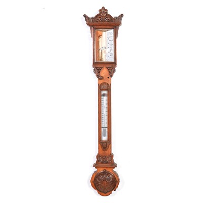 Lot 325 - Barometer with Victorian carved oak case