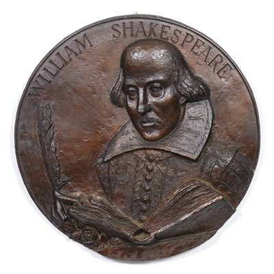 Lot 177 - Large circular wall plaque, carved with a bust of William Shakespeare