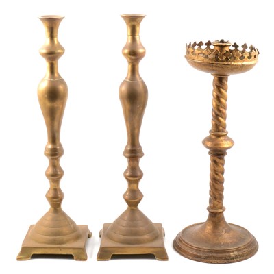 Lot 181 - Pair brass candlesticks and another Gothic style gilt metal candlestick