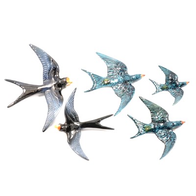 Lot 54 - Set of three Beswick swallows, and two others.