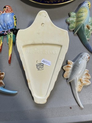 Lot 45 - Kensington Ware budgerigar wall pocket, and Solian Ware and other budgerigar wall plaques.