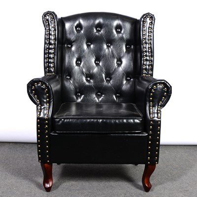 Lot 323 - Modern leather wingback armchair