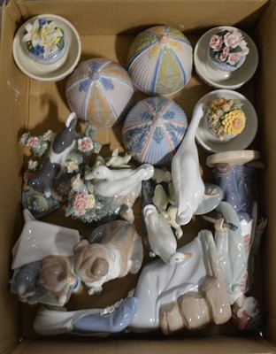 Lot 6 - Eleven Lladro and Nao eggs and figurines.