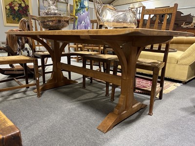 Lot 1007 - An Arts & Crafts oak dining table