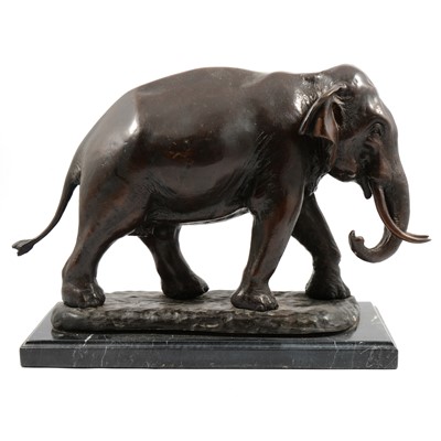 Lot 119 - A hollow cast patinated model of a bull elephant