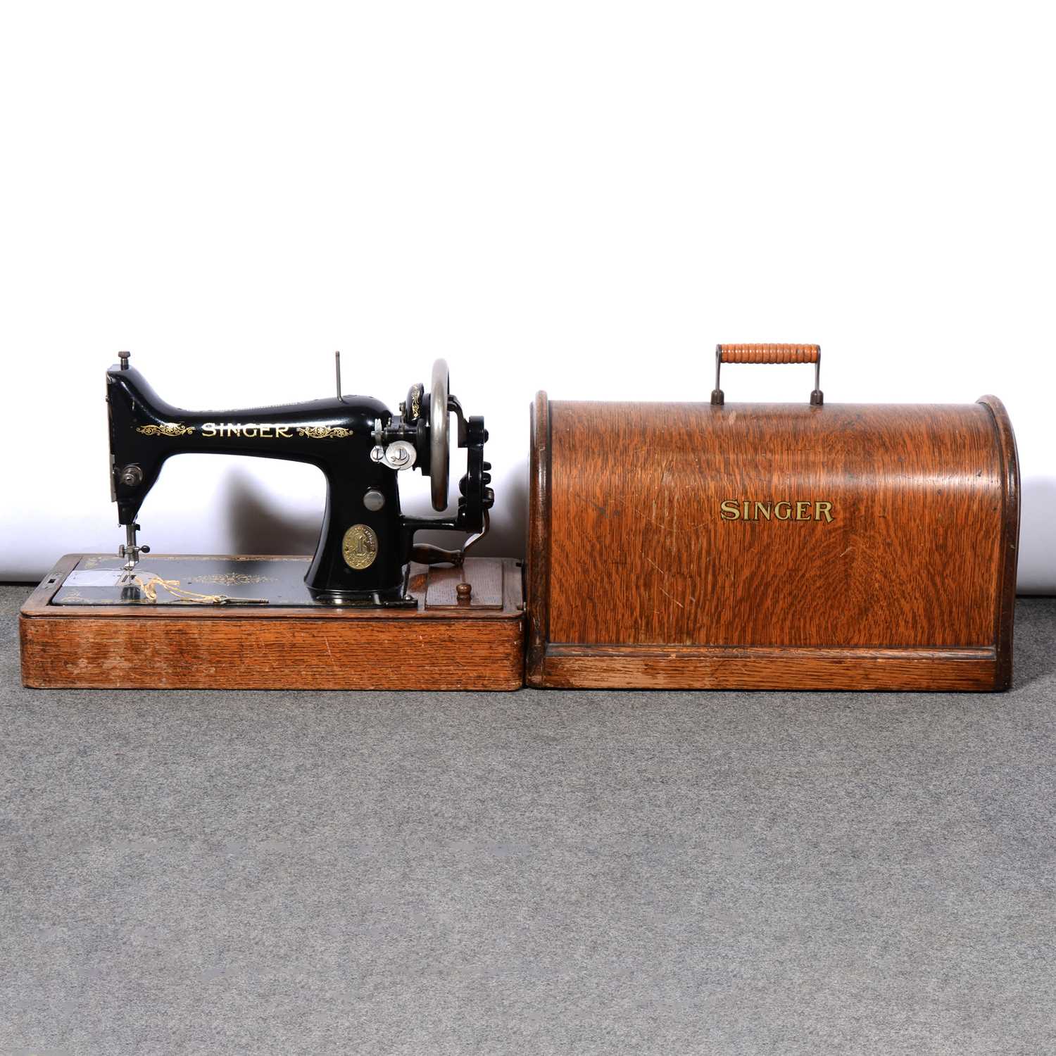Lot 228 - An early 20th century Singer sewing machine and girls sewing machine.