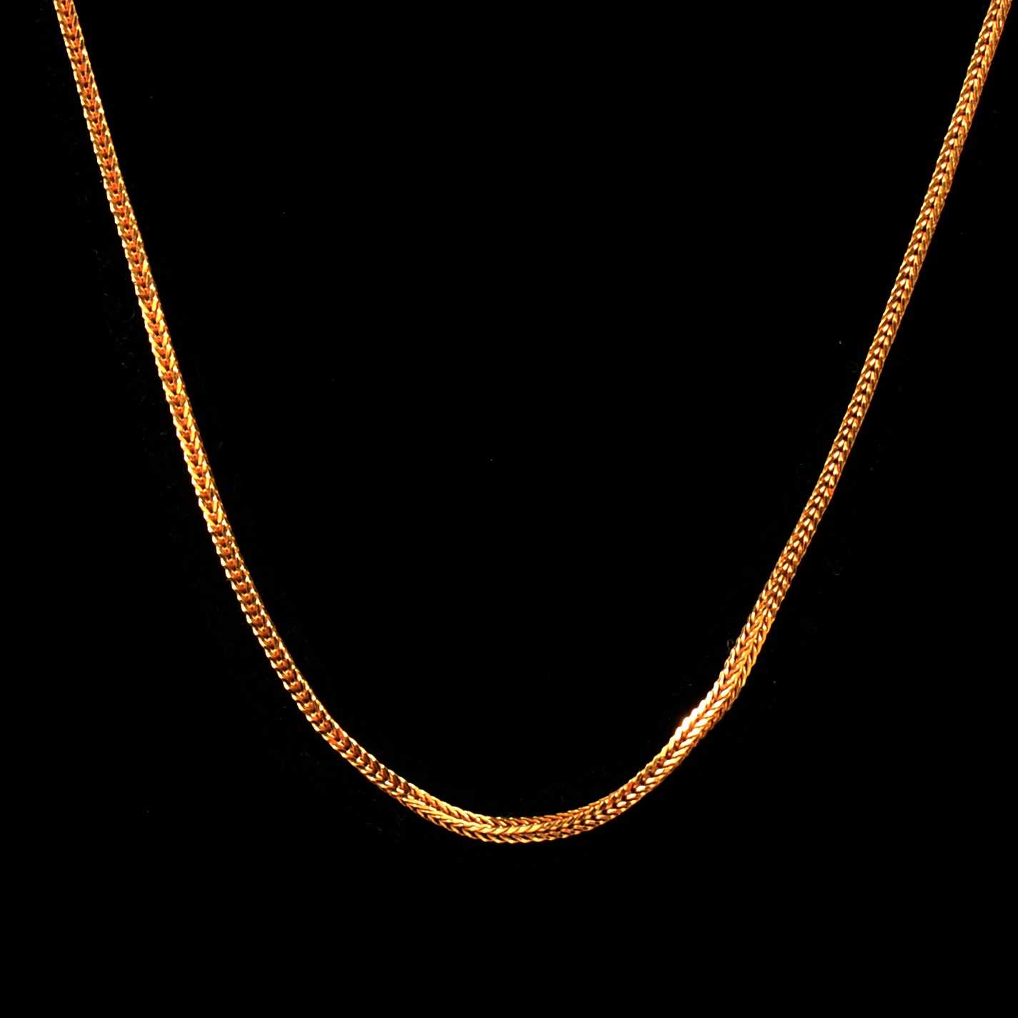 Lot 157 - A yellow metal chain necklace.