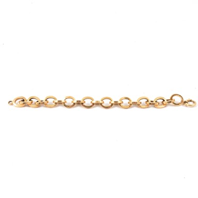 Lot 124 - A yellow metal hollow oval link bracelet.