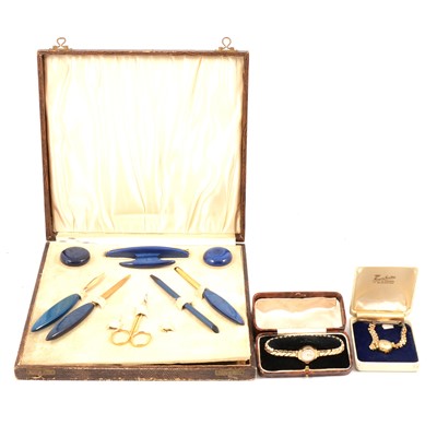Lot 136 - Miniature brass quartz clocks, wrist watches, simulated pearl necklaces and part manicure set.