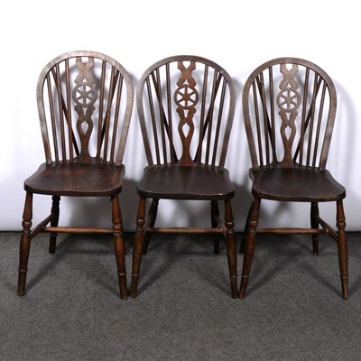 Lot 376 - Three elm and ash wheel back kitchen chairs