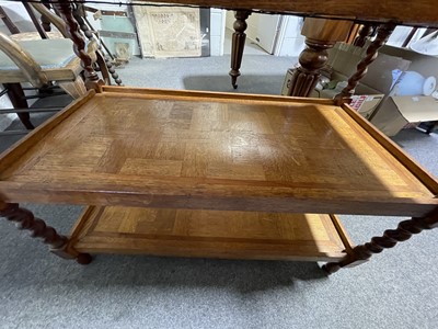 Lot 292 - Oak marquetry three-tier table with barley twist legs.