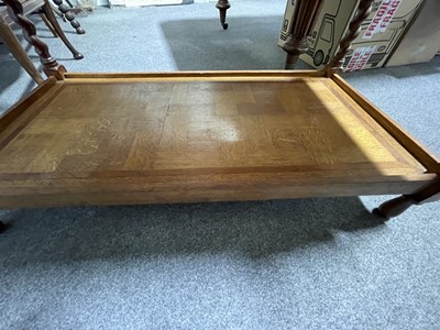 Lot 292 - Oak marquetry three-tier table with barley twist legs.