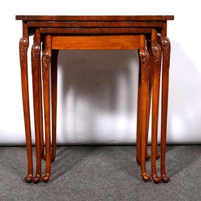 Lot 305 - Nest of three walnut coffee tables