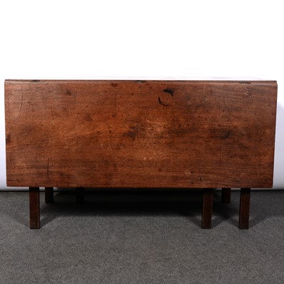 Lot 312 - George III mahogany drop-leaf dining table