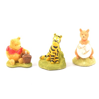 Lot 50 - Collection of Winnie the Pooh related figurines and collectibles