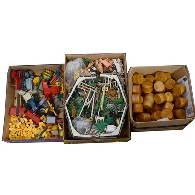 Lot 242 - Britains Toys farm, three trays including tractors, attachments and accessories.