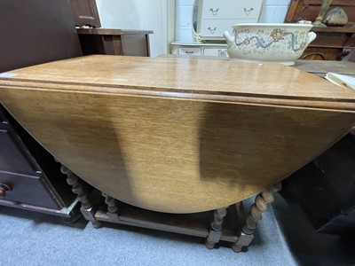 Lot 334 - Oak barley twist gateleg table