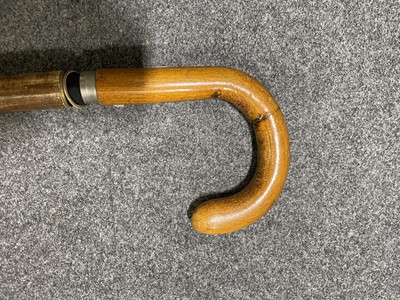 Lot 109 - Walking stick umbrella, with collapsing case, length 89cm.