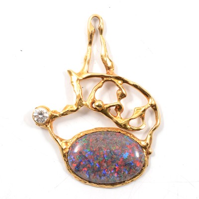 Lot 172 - A yellow metal pendant set with an oval cabochon cut treated opal.