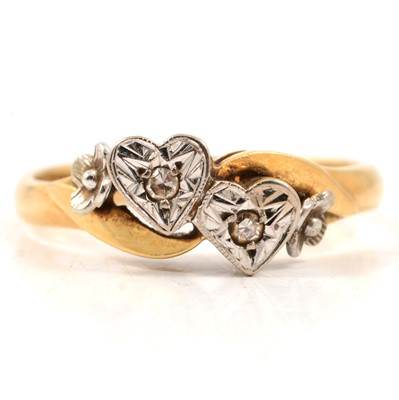 Lot 12 - A diamond double heart illusion set  crossover ring.