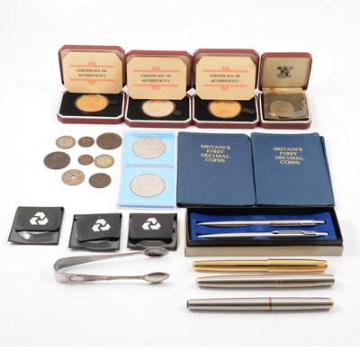 Lot 107 - A collection of Commemorative coins and parker pens.