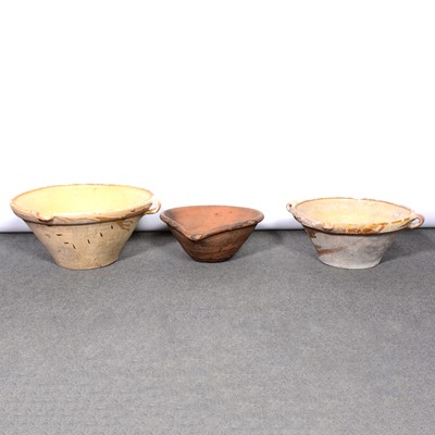 Lot 457 - Collection of assorted earthenware vessels, large conical bowls, and carved ducks