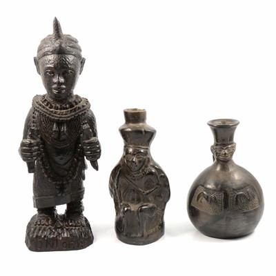 Lot 118 - Carved African hardwood Oni Ife statue; and two African burnished earthenware vessels.