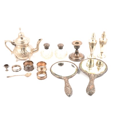 Lot 201 - Two silver-backed hand mirrors; four silver napkin rings; dwarf candlestick etc