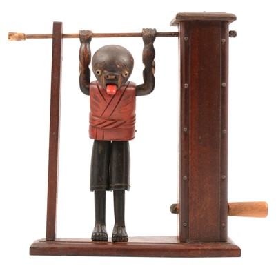 Lot 122 - Japanese wooden 'Kobi' toy acrobat, early 20th Century