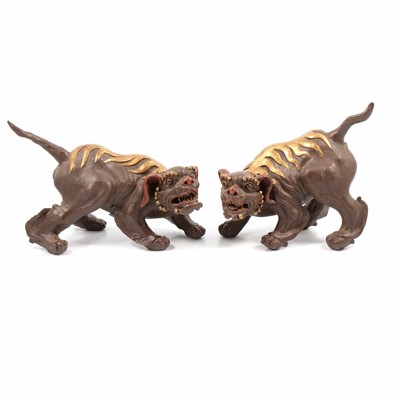 Lot 23 - A pair of Chinese pottery 'Dogs of Fo' figures