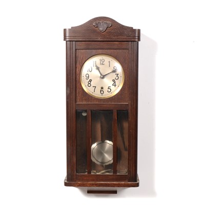 Lot 297 - An oak-cased wall clock, 1930s